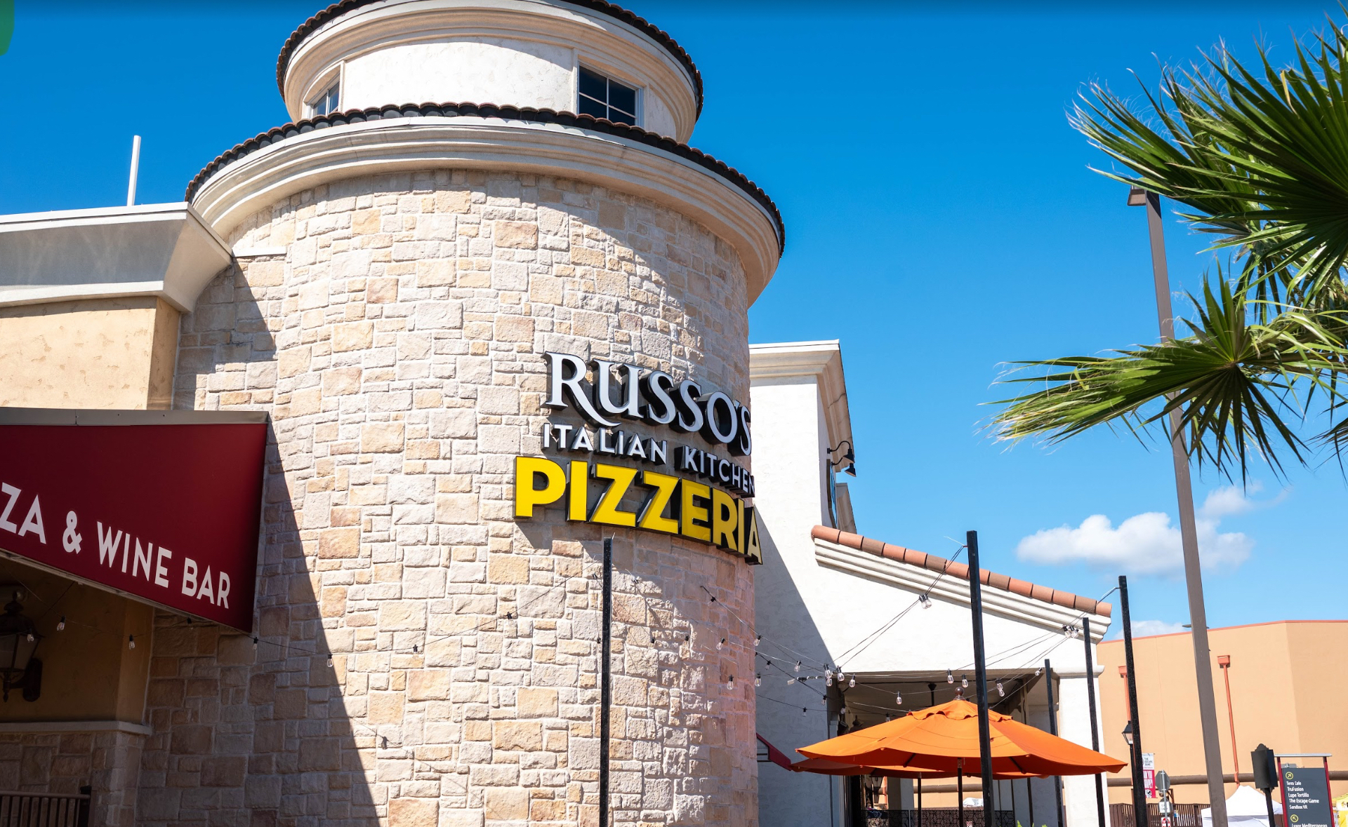Russo's Italian Kitchen storefront with stone façade and signage